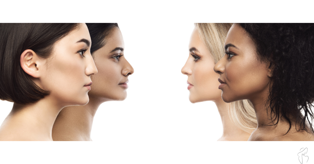 Four  women with different skin tones and undertones facing each other in various directions.