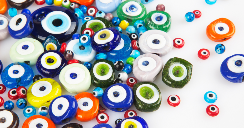 A pile of colorful glass Evil Eye Amulet.


