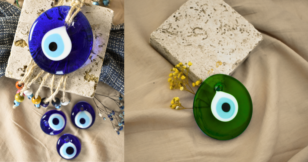 A collage of blue and green  evil eye beads 