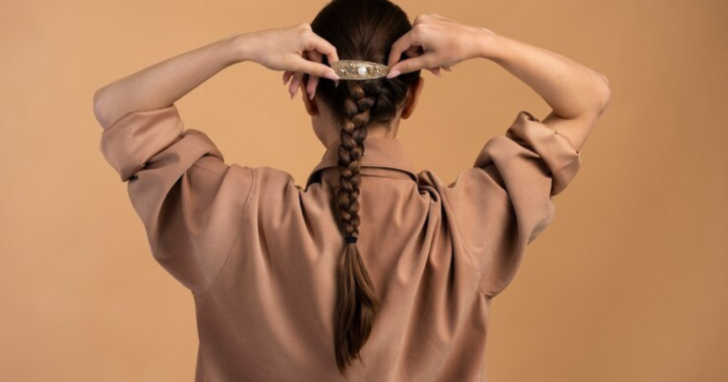 Image of woman with classic three-strand braid style 